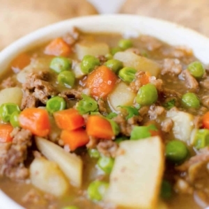 close up of a bowl with ground beef stew