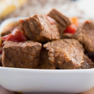 side view of carne guisada in a small bowl