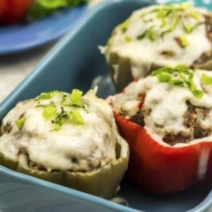 a dish filled with stuffed peppers