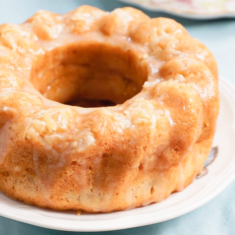 a delicious coconut bundt cake served on a large plate