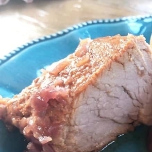 close up of a bourbon pork tenderloin on a plate