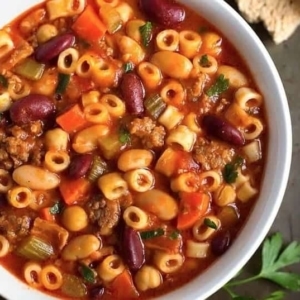 overhead shot of pasta e fagioli in a bowl