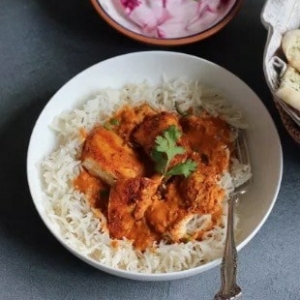 a serving of chicken tikka masala in a bowl