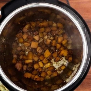 cooking spices in butternut squash soup