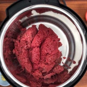 adding ground beef to the instant pot