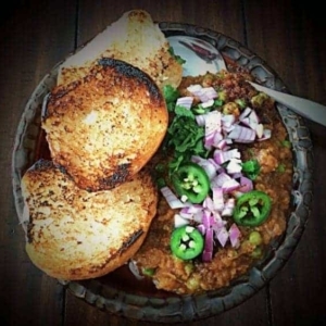 overhead shot of pav bhaji on a plate