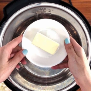 a plate of butter over the instant pot