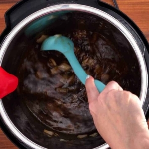 mixing all of the pumpkin soup ingredients