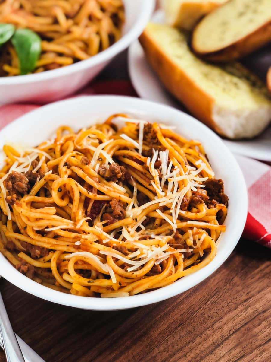 homemade spaghetti and meat sauce with garlic butter toast