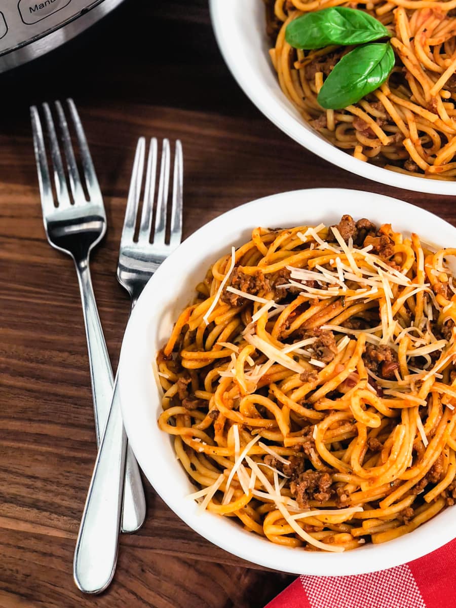 spaghetti and meat sauce served in a bowl