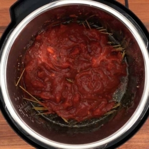 pasta sauce added to spaghetti and meat sauce in the instant pot