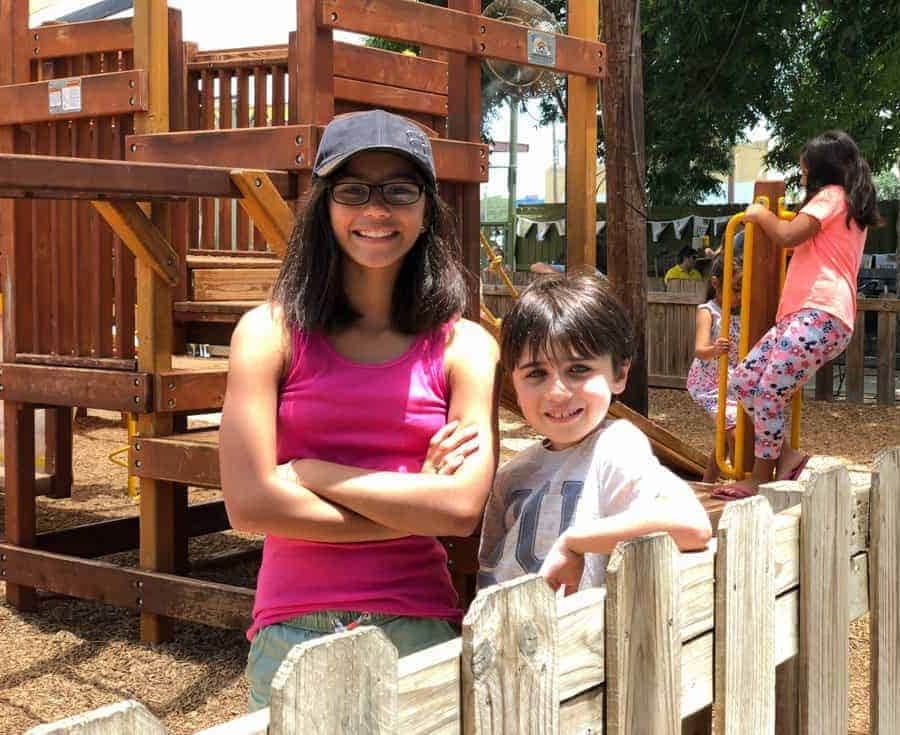 the kids having fun in the play area at the cove san antonio