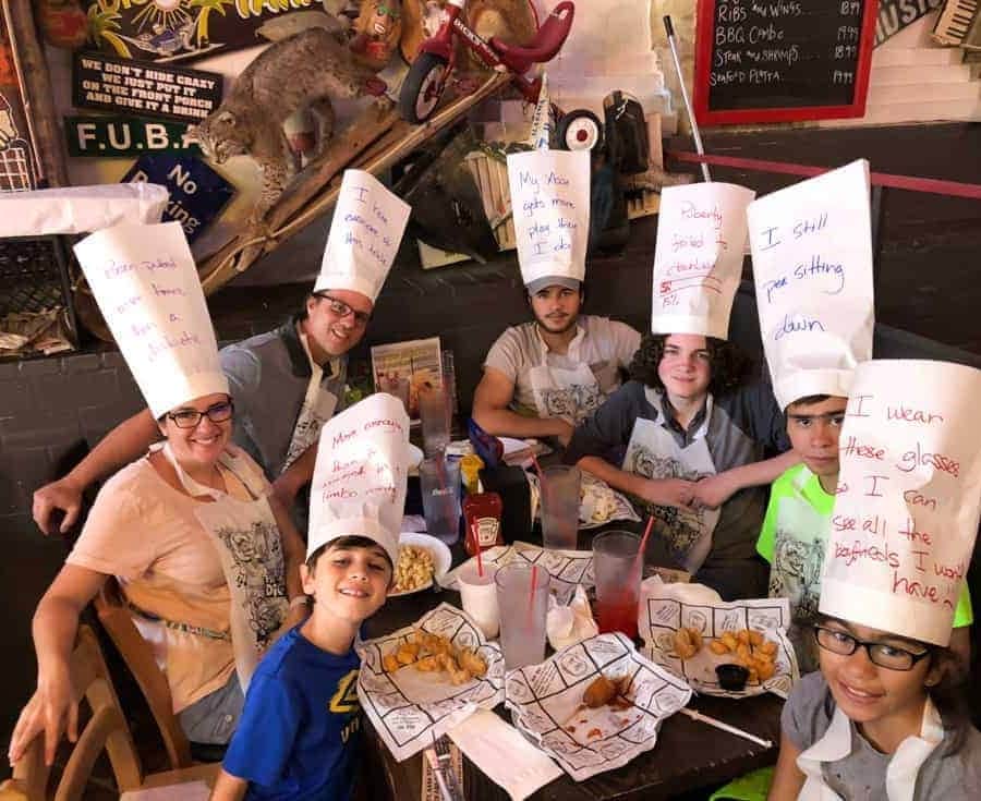 the whole family with funny hats at dick's last resort restaurant the riverwalk san antonio