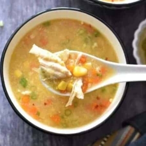 a spoonful of chicken sweet corn soup