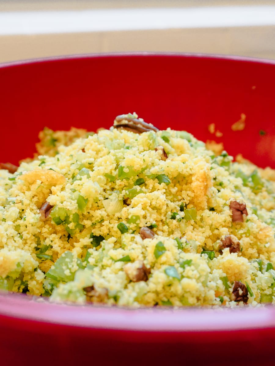 mixing the ingredients for cornbread stuffing