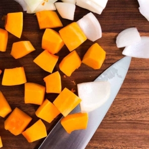 cutting butternut squash and onion