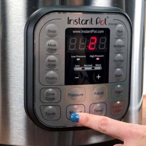 setting the instant pot to cook on manual high pressure for 2 minutes