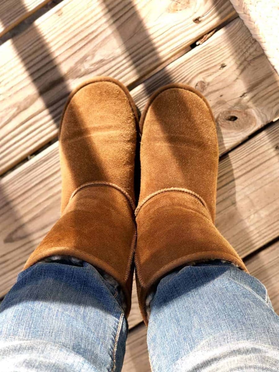 Valerie wearing a pair of Minnetonka women's Olympia boots