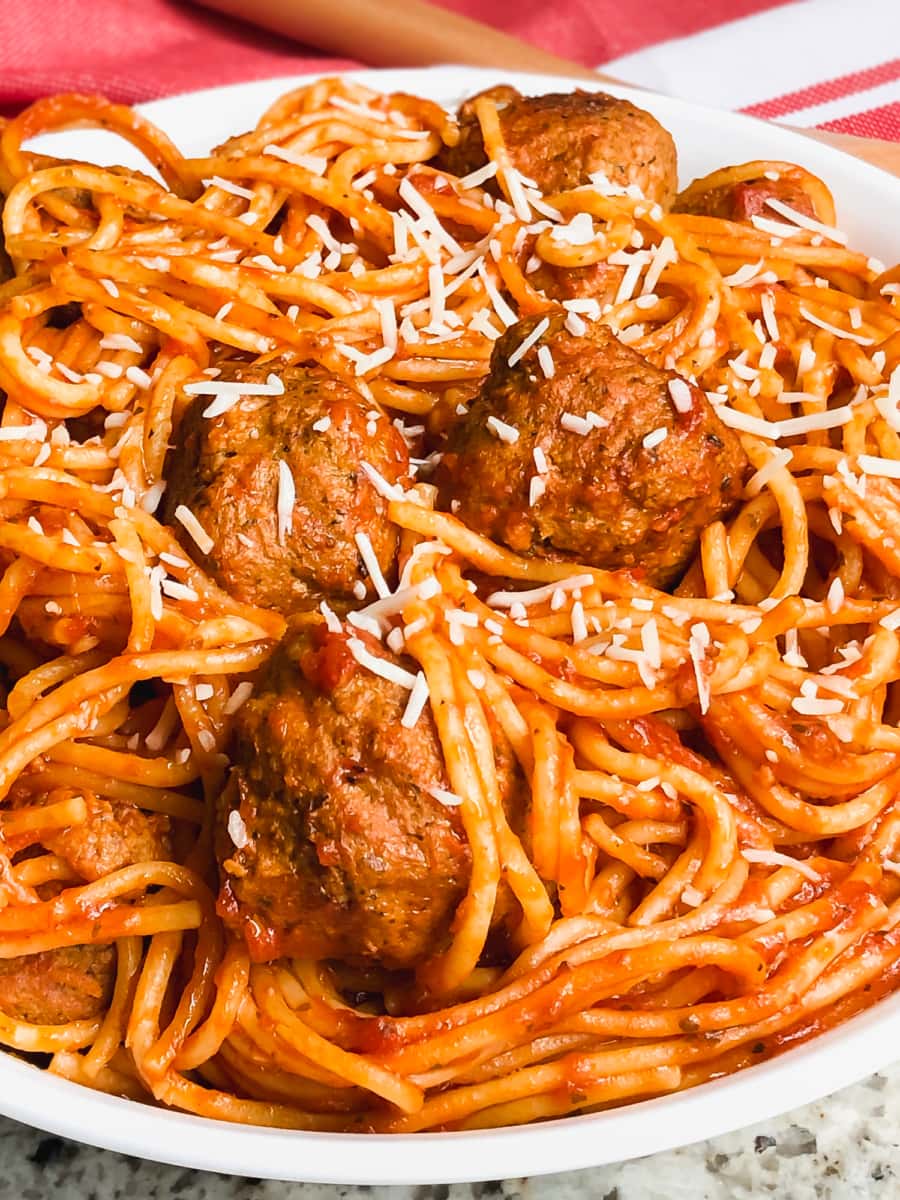 a bowl of spaghetti and meatballs