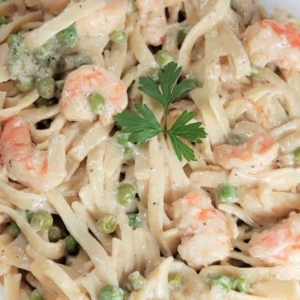 close up of dijon shrimp linguine garnished with cilantro