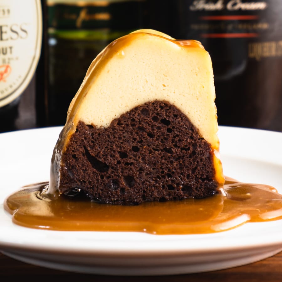 a delicious piece of irish car bomb chocoflan on a plate