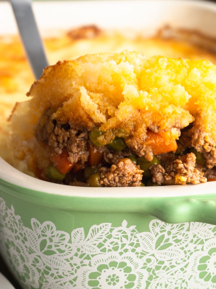 a serving of traditional shepherds pie being scooped