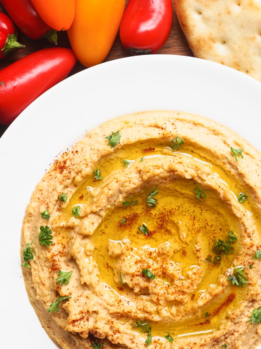 hummus dip garnished with cilantro