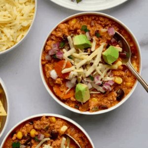 overhead shot of two bowls of buffalo chicken chili