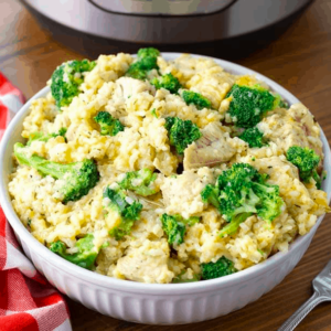 a large bowl filled with chicken broccoli rice casserole