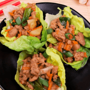 a plate of chicken lettuce wraps