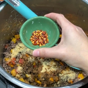 adding red pepper flakes to couscous