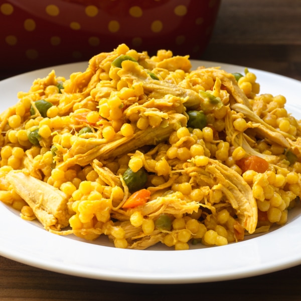 chicken couscous on a large white plate