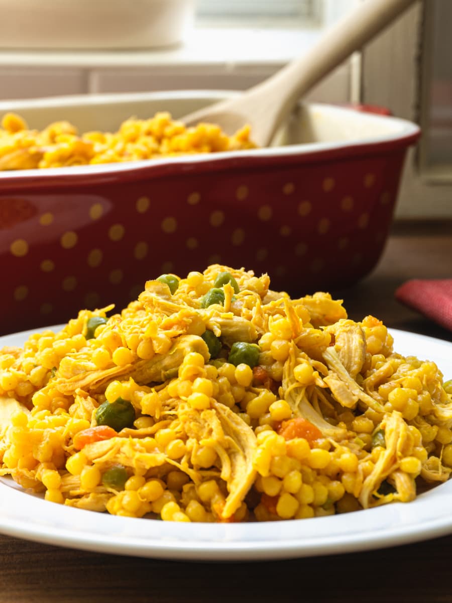 side view of chicken and couscous on a plate