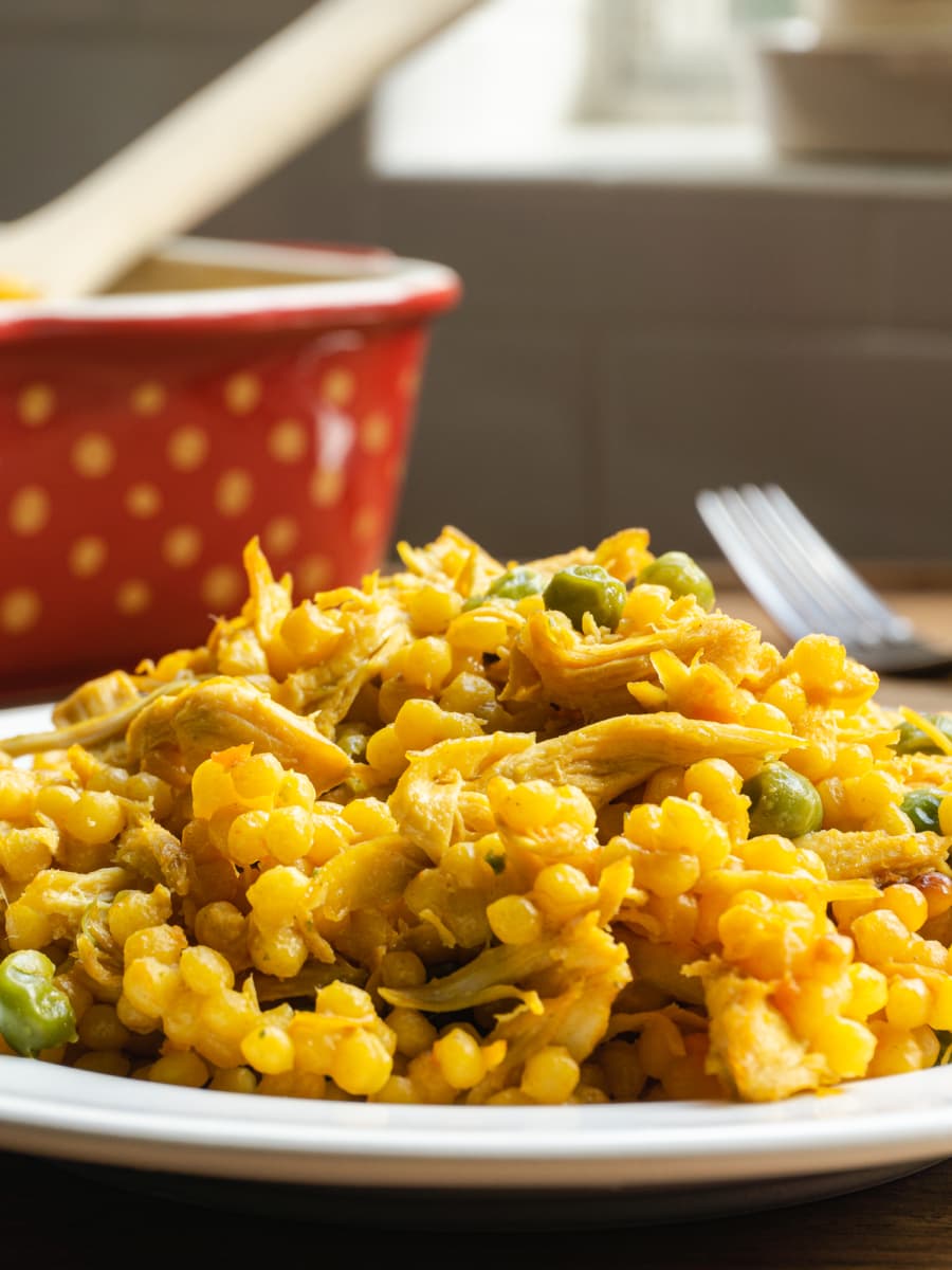 chicken and israeli couscous on a plate