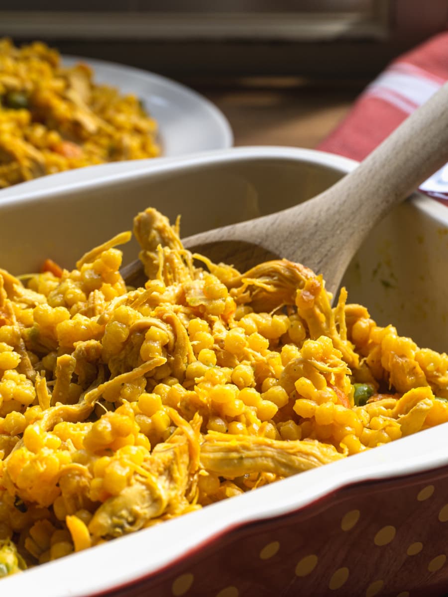 close up of chicken israeli couscous in a serving bowl