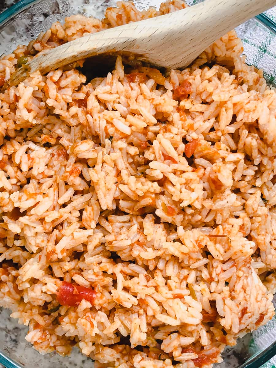 overhead shot of salsa rice in a glass bowl