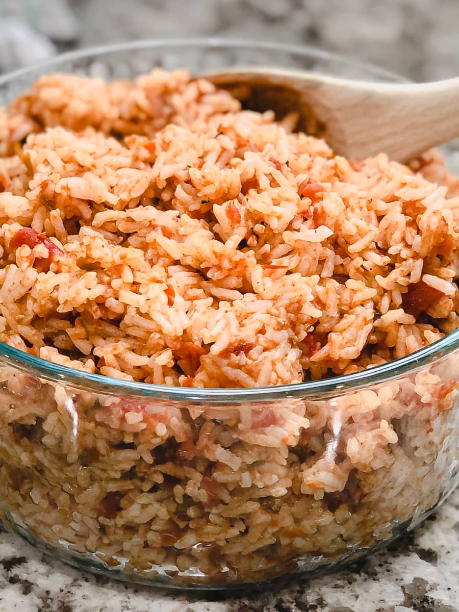 partial shot of a glass bowl of salsa rice