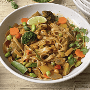 a serving of vegan thai curry noodles in a bowl