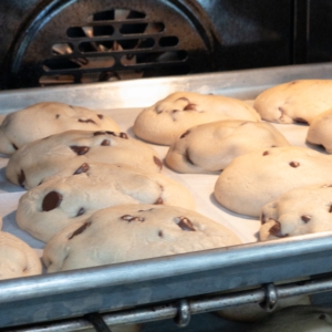 chocolate chip cookies baking in the oven