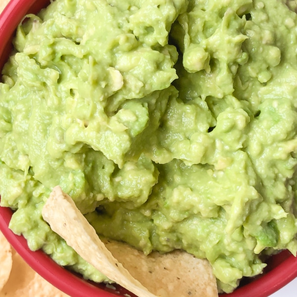 overhead shot of a chip dipped in guacamole