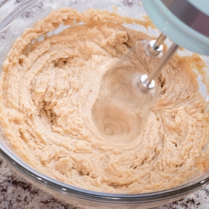 mixing softened butter brown sugar and granulated sugar