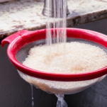 rinsing rice in a strainer to remove starches for instant pot jasmine rice