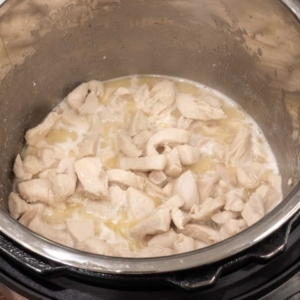 cooked chicken pieces in the pressure cooker