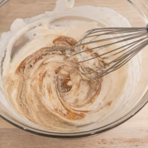 whisking white pepper and better than bouillon into the heavy cream and flour