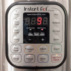 setting the instant pot to cook on manual high pressure for nine minutes