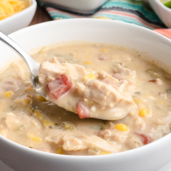 a spoonful of white chicken chili from a bowl