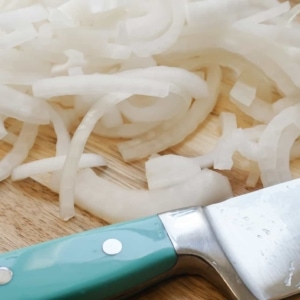 a pile of thinly sliced onions