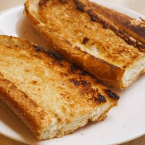 french bread slices that have been buttered and toasted