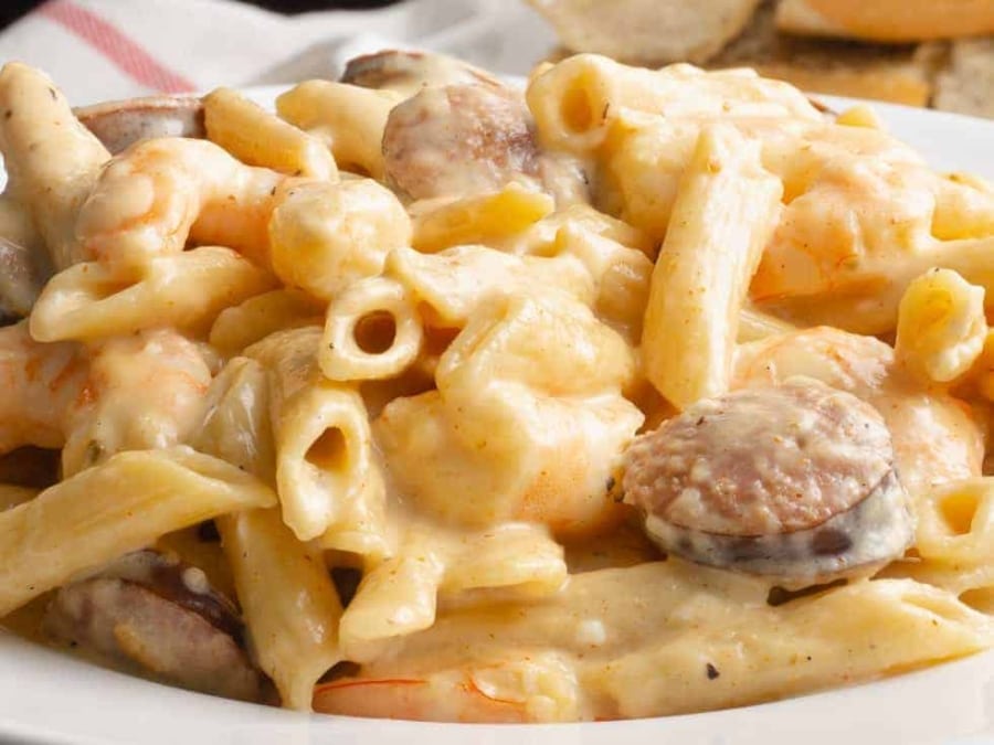 penne pasta, sausage, and shrimp covered in cajun alfredo sauce