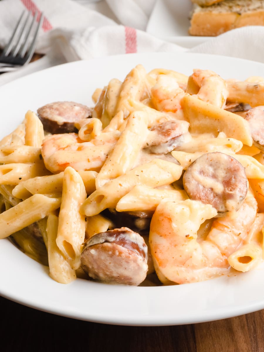 plate of instant pot creamy cajun shrimp alfredo with sausage